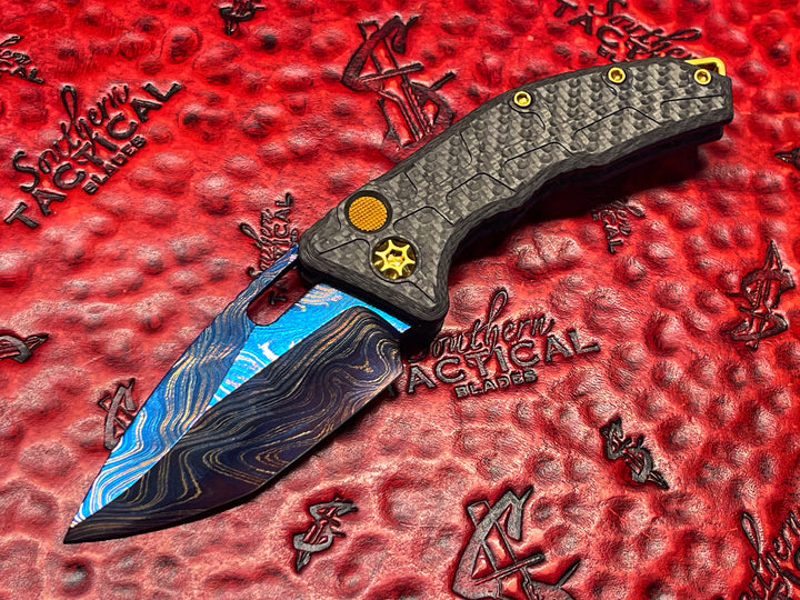 Heretic Knives Martyr Auto, Blued Damascus Blade, TiN Accents, Carbon Fiber Scales
