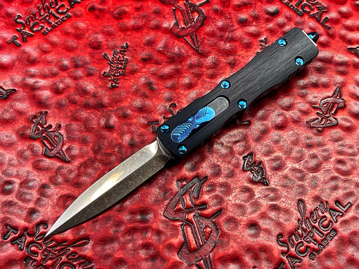 MARFIONE Custom Knives Dirac, Double Edge Spike Grind, Stonewash, Hefted Aluminum Chassis, w Blue Titanium accents, double action OTF knife