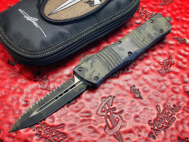MARFIONE “Fuck Off” Combat Troodon, Double Edge Full Serrated, Od Green Cerakote Camouflage, Double Action OTF Knife