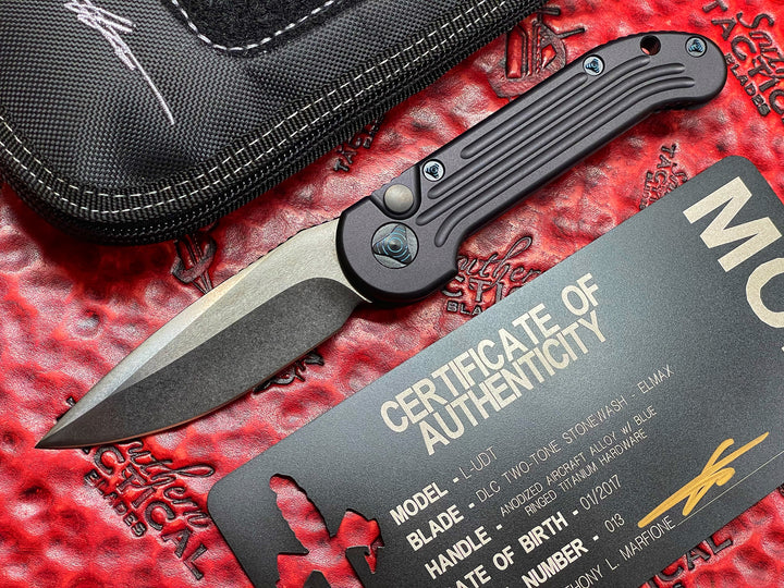 MARFIONE custom LUDT Single Edge, Stonewash DLC, Black Anodized Alloy Scales, Blue Ringed Ti accents, automatic OTS Knife
