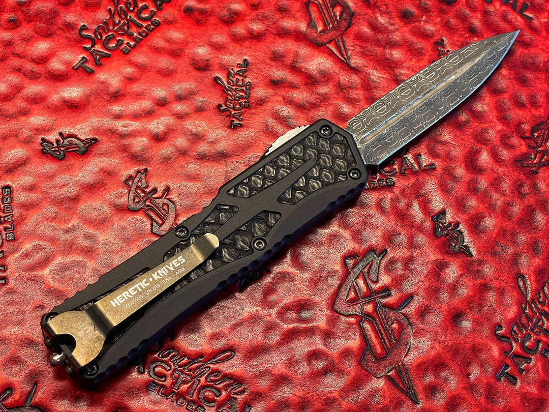 Heretic Knives Colossus, Hand Ground Double Edge, Vegas Forge Reptilian Damascus, Anodized Aluminum, Black Python Inlays, DLC Hardware, Double Action OTF Knife