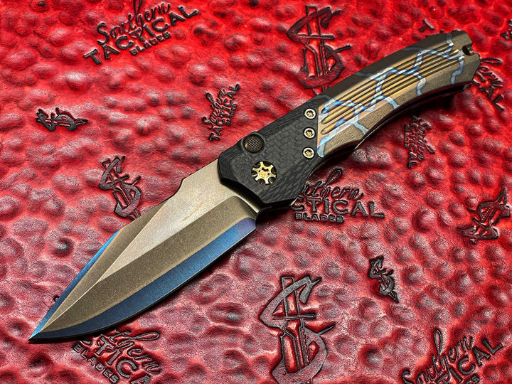 Heretic knives Wraith Auto OTS, Blued Takefu Shiro 2 San Mai, Carbon Fiber Bolster, Flamed Titanium w/ Bronze Titanium Accents