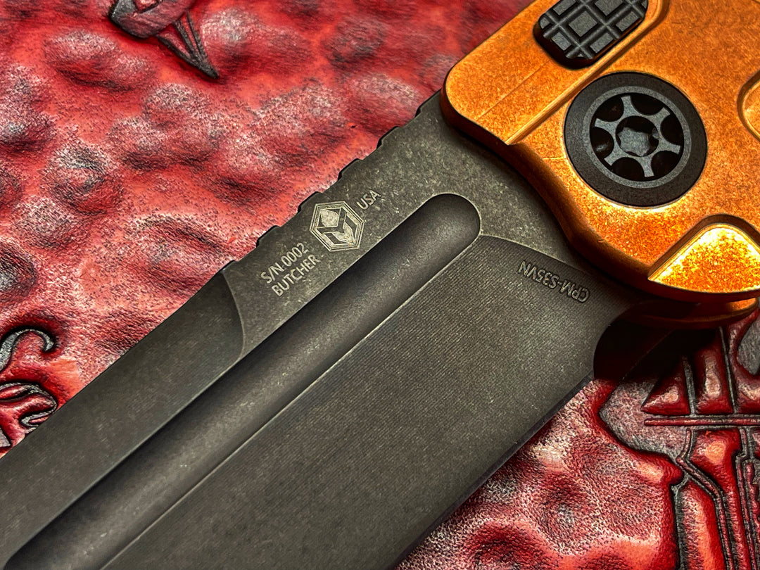 Heretic Knives Butcher Auto, DLC Blade, Carbon Fiber and copper Scales. OTS SN 002
