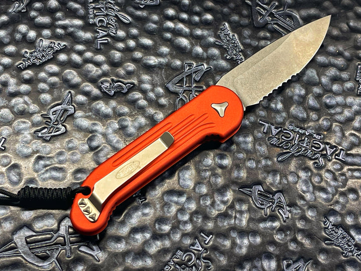 Microtech LUDT Single Edge Stonewash Part Serrated Orange Automatic OTS Knife