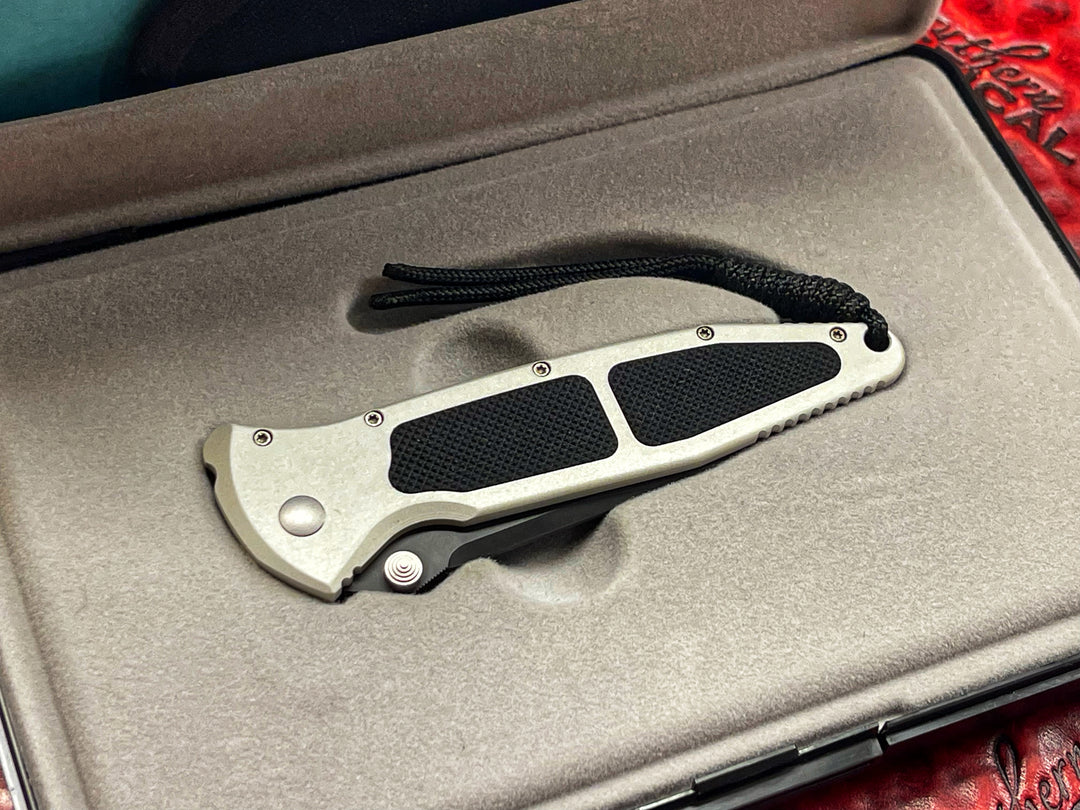 Microtech Mini Socom Manual Action, Single Edge, Clear (Silver), Black Blade Plain, Folding Knife