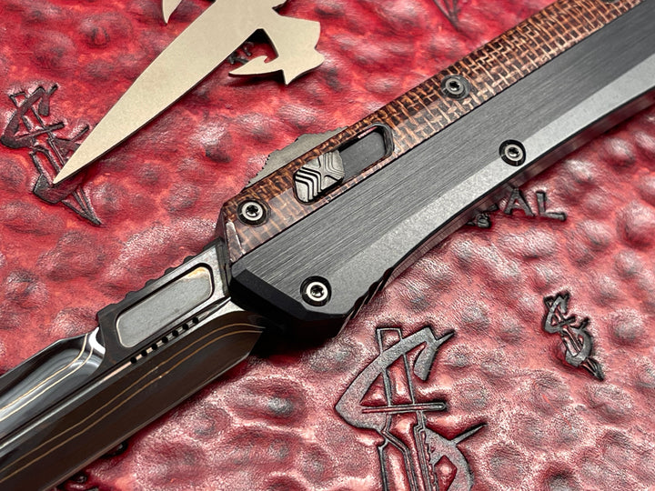Marfione Custom Glykon 
Hot Blued WWII Pocket Change Pattern Broken Anvil Damascus,
Hefted Black Alloy w/ Burlap Micarta Overlay & DLC Two-Tone
Hardware, Double Action OTF Knife