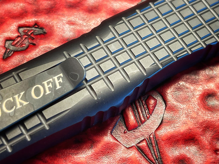 MARFIONE “Fuck Off” Combat Troodon Delta Frag, Double Edge Full Serrated, Urban Camo Cerakote Accents, Double Action OTF Knife
