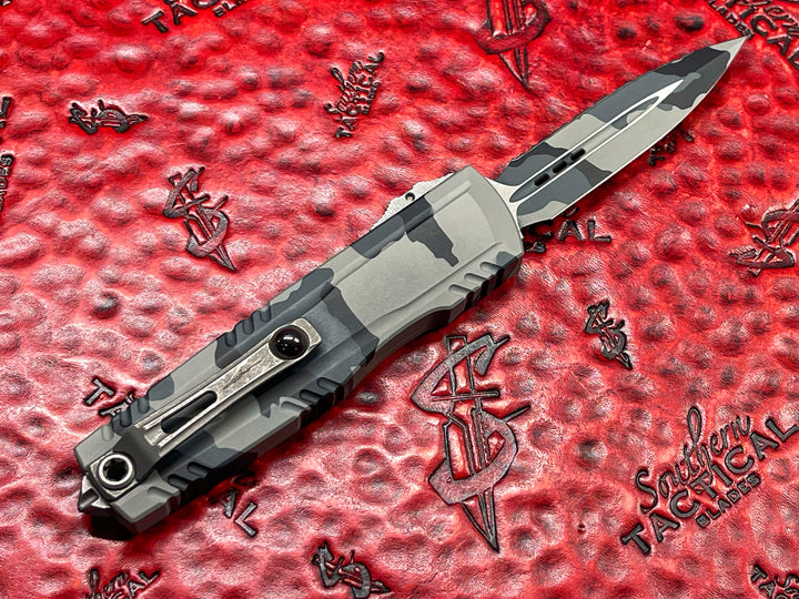 Microtech Luminary ZBP Double Edge Signature Series Urban Camo Full Serrated, Tritium Button (PRE OWNED)Double Action OTF Knife