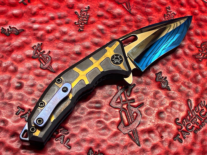 Heretic Knives Martyr Recurve Manual, Double Clade Steel, Blued High Polish, DLC Brass Scale, Folding knife