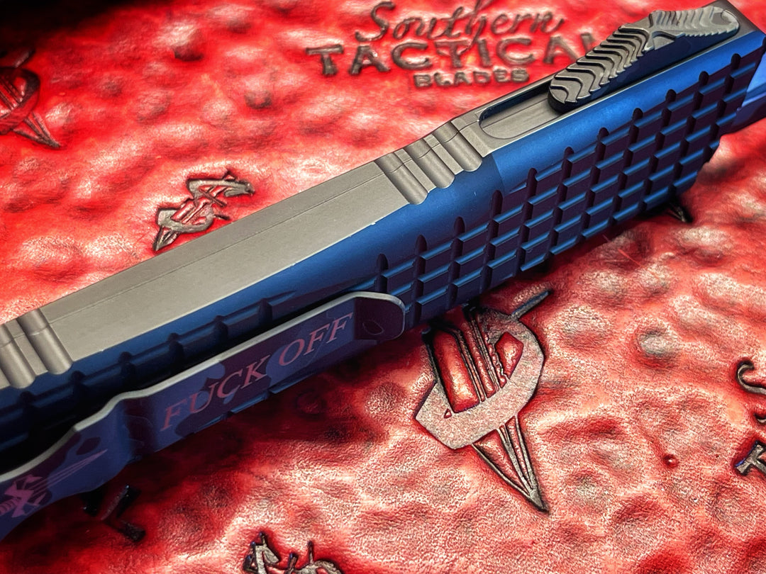 MARFIONE “Fuck Off” Combat Troodon Delta Frag, Double Edge Full Serrated, Urban Camo Cerakote Accents, Double Action OTF Knife