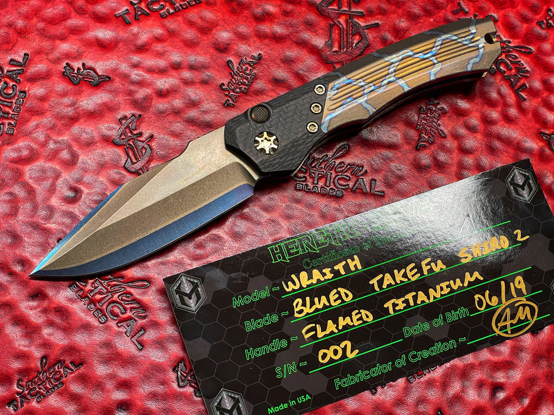 Heretic knives Wraith Auto OTS, Blued Takefu Shiro 2 San Mai, Carbon Fiber Bolster, Flamed Titanium w/ Bronze Titanium Accents
