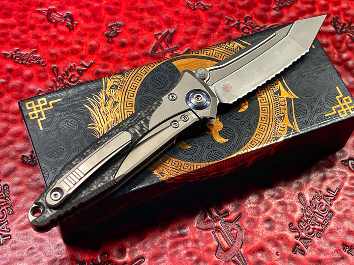 Microtech Socom Bravo Tanto Edge, Full Serrated Bead Blast Finish Titanium Handle with Carbon Fiber Scales- Blue Pivot Collar. Full Serrations By Anthony (Tony) Marfione