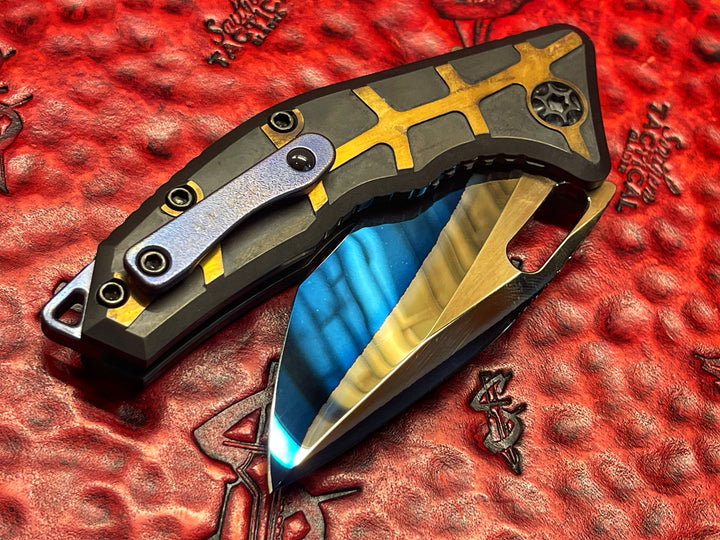 Heretic Knives Martyr Recurve Manual, Double Clade Steel, Blued High Polish, DLC Brass Scale, Folding knife