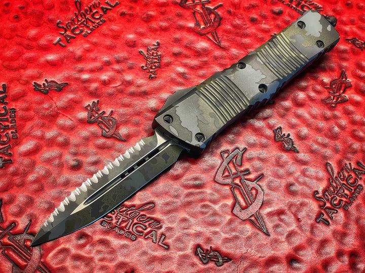 MARFIONE “Fuck Off” Combat Troodon, Double Edge Full serrated, Prototype Camouflage Cerakote, Double action OTF Knife