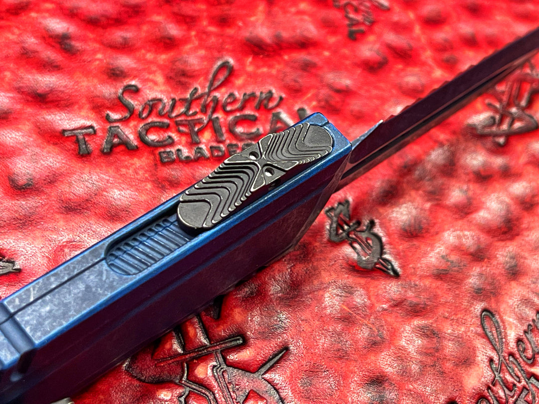 Microtech Luminary ZBP Double Edge Signature Series Weathered Blue Full Serrated Tritium Button Insert, (PRE OWNED) Double Action OTF Knife