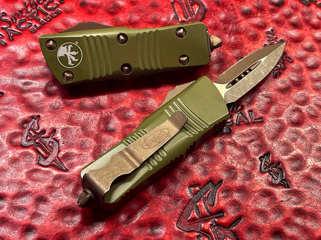 Microtech Mini Troodon Double Edge Bronzed Apocalyptic, Cerakote OD Green, Full Serrated