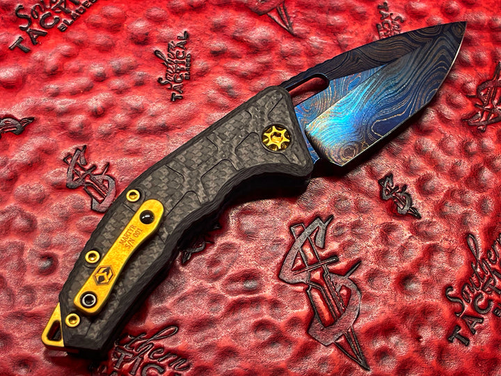 Heretic Knives Martyr Auto, Blued Damascus Blade, TiN Accents, Carbon Fiber Scales
