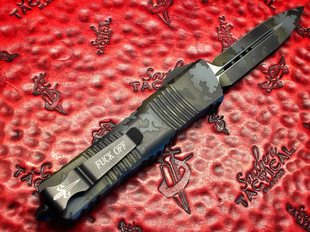 MARFIONE “Fuck Off” Combat Troodon, Double Edge Full serrated, Prototype Camouflage Cerakote, Double action OTF Knife