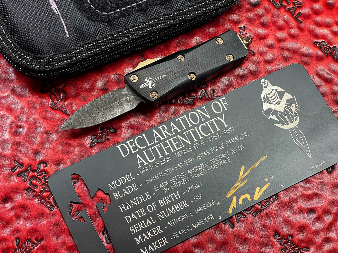 Marfione Custom Mini Troodon, Double Edge Spike Grind, Sharktooth Pattern Vegas Forge Damascus, Bronzed Ringed Accents