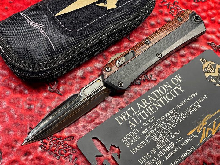 Marfione Custom Glykon 
Hot Blued WWII Pocket Change Pattern Broken Anvil Damascus,
Hefted Black Alloy w/ Burlap Micarta Overlay & DLC Two-Tone
Hardware, Double Action OTF Knife