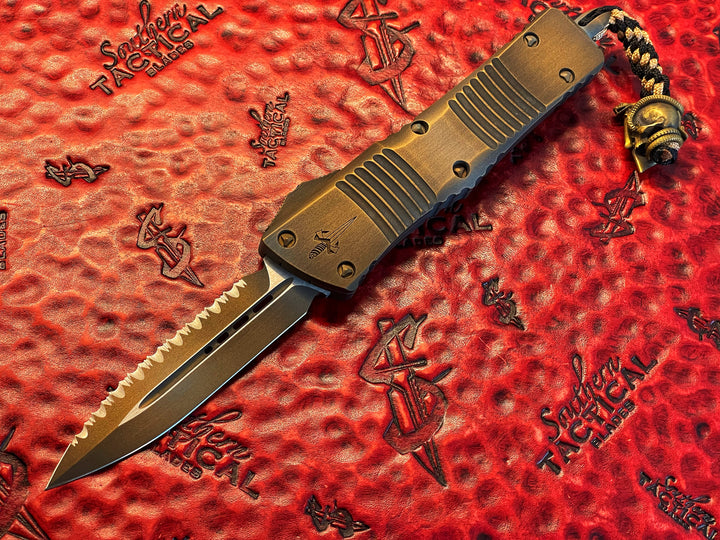 Marfione Custom Combat Troodon, Memento Mori, Double Edge, Full Serrated, Antique Bronze Cerakote w/  Matching Hardware, Spartan Meadow Viper Bead, Double Action OTF Knife 1 of 1