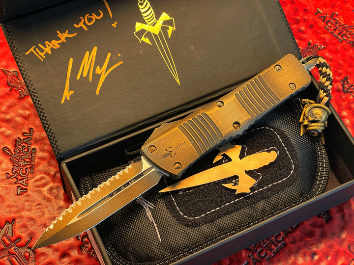 Marfione Custom Combat Troodon, Memento Mori, Double Edge, Full Serrated, Antique Bronze Cerakote w/  Matching Hardware, Spartan Meadow Viper Bead, Double Action OTF Knife 1 of 1