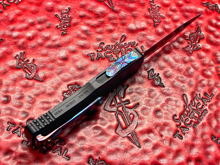 Marfione Custom Hera, Double Edge Spike Grind, Hot Blued Vegas Forge Reptilian Pattern Damascus, Anodized Alloy, Zurcuti Button and Pocket Clip, Two Tone DLC Hardware