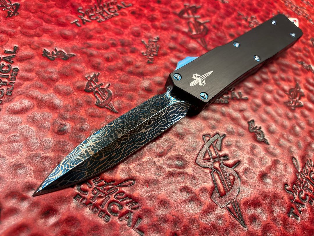Marfione Custom Knives Scarab II Double Edge, Spike Grind, Blued Vegas Forge Vines and Roses Damascus, Hefted Aluminum w/ Blue Ringed Titanium Accents