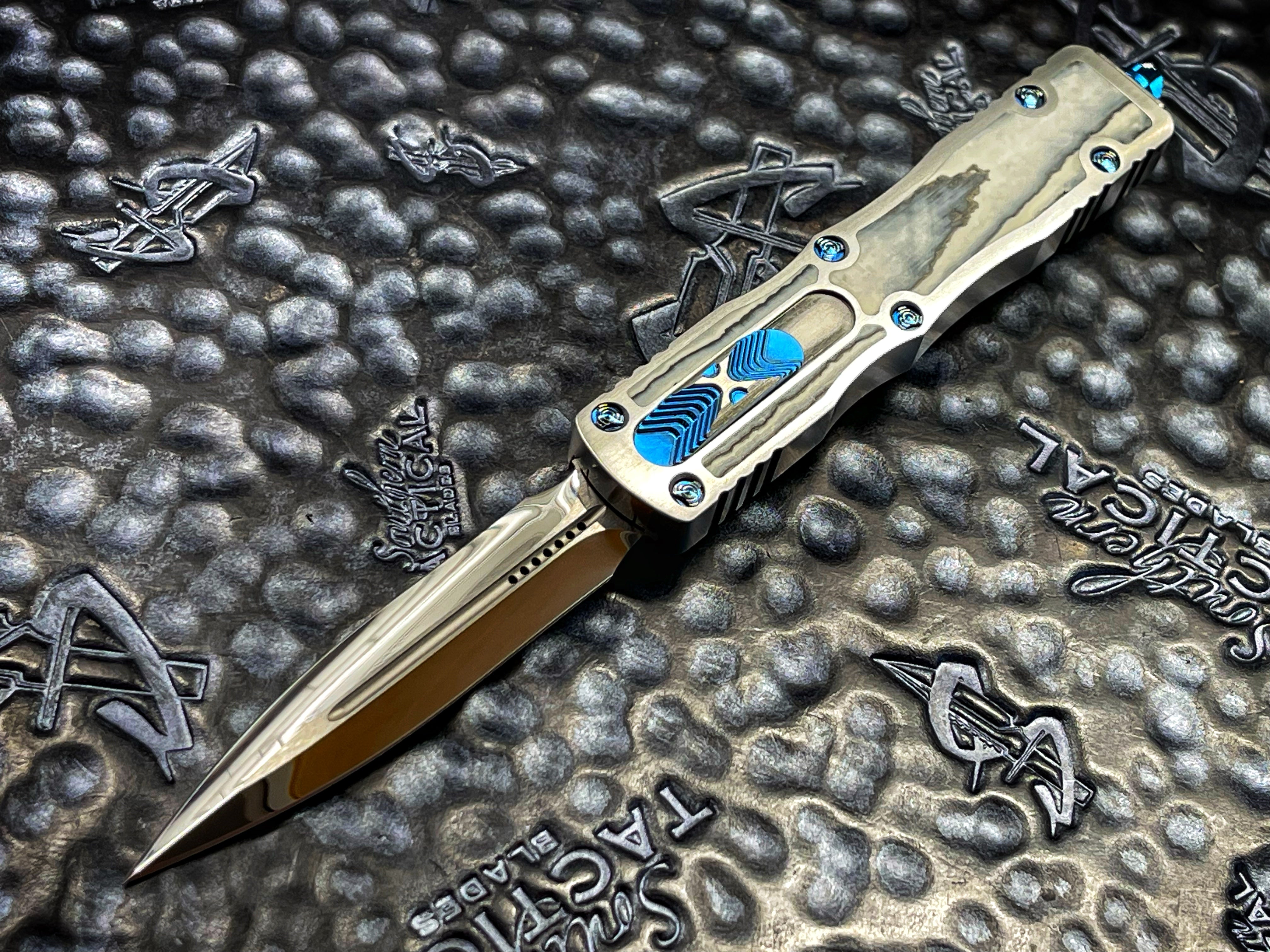 Marfione Custom Knives Dirac Double Edge, Mirror Polished, Satin Finish 416 Stainless Steel w/ QTPT Carboquartz Inlay, Blue Ringed Titanium Hardware