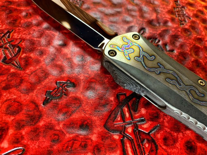 Heretic Knives Manticore X, Mirror Polished Spike Grind, DLC Blazed Titanium