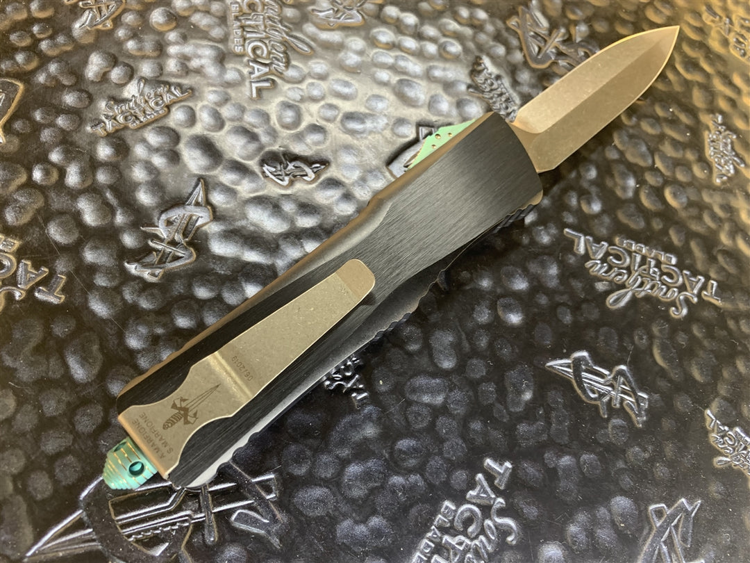 Marfione Custom Knives Combat Troodon Double Edge Spike Grind, Bronzed Stonewashed, Bronzed Ringed Green Titanium Hardware