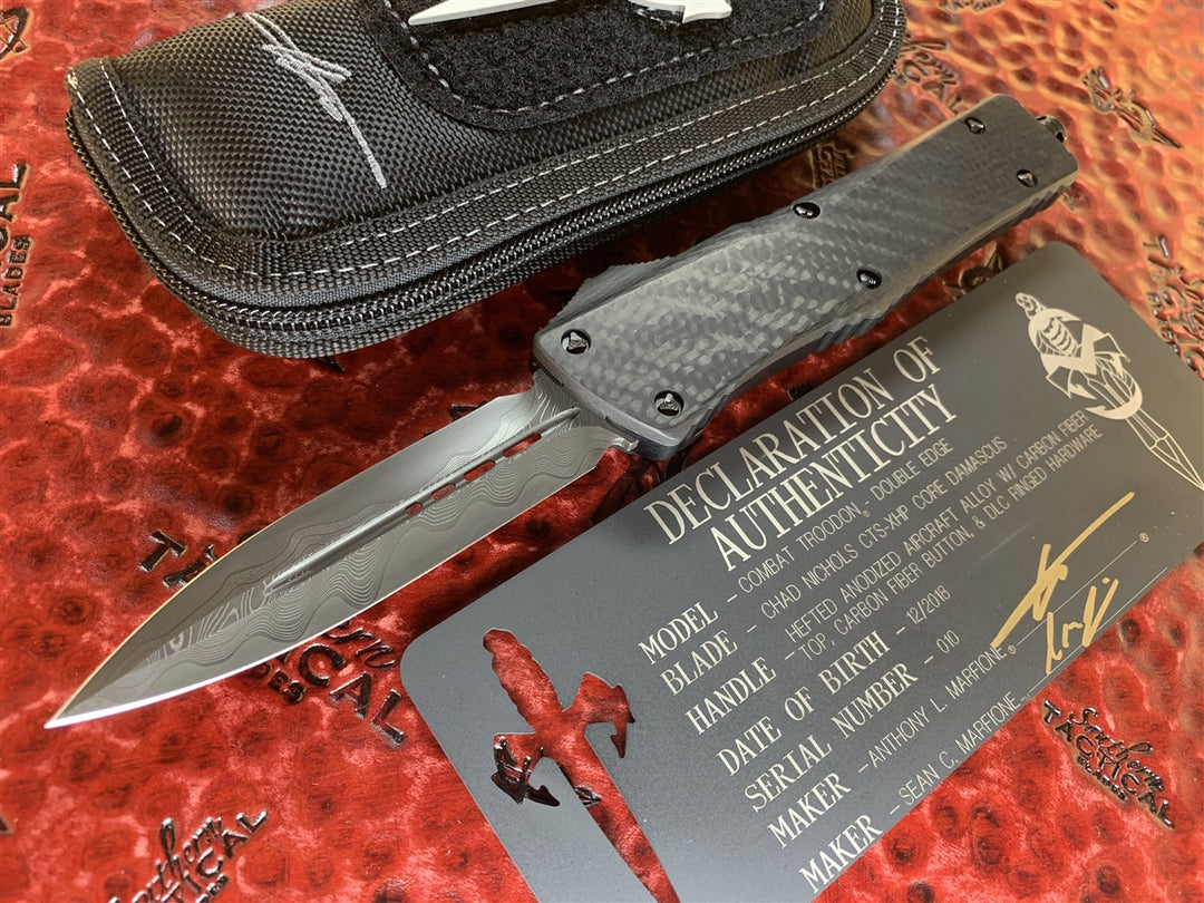 Marfione Custom Knives Combat Troodon Double Edge Chad Nichols CTX XHP Core Damascus, Carbon Fiber Top and Button, Hefted Aluminum Chassis, DLC Ringed Hardware