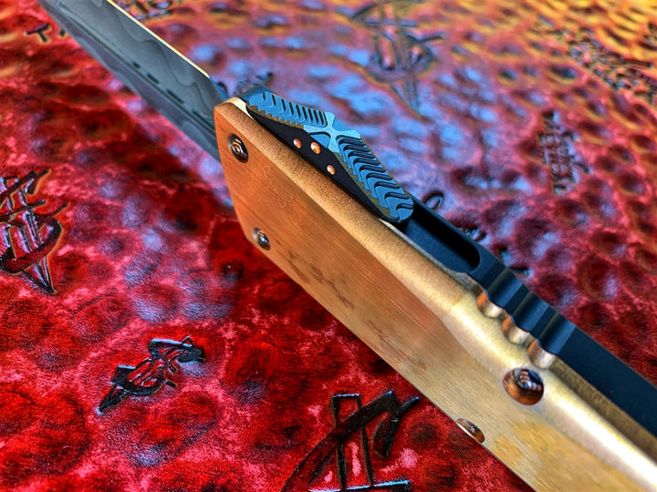 Marfione Custom Knives Combat Troodon Double Edge Chad Nichols CTX XHP Core Damascus, Copper Top, Aluminum Chassis, Copper Ringed Hardware