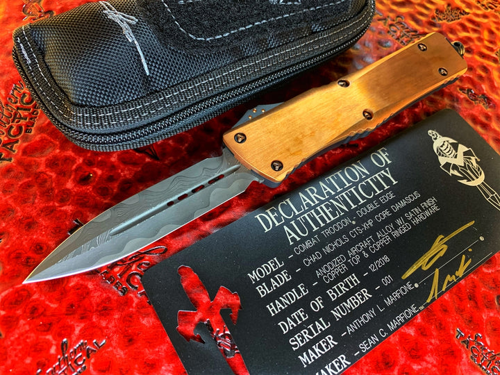 Marfione Custom Knives Combat Troodon Double Edge Chad Nichols CTX XHP Core Damascus, Copper Top, Aluminum Chassis, Copper Ringed Hardware