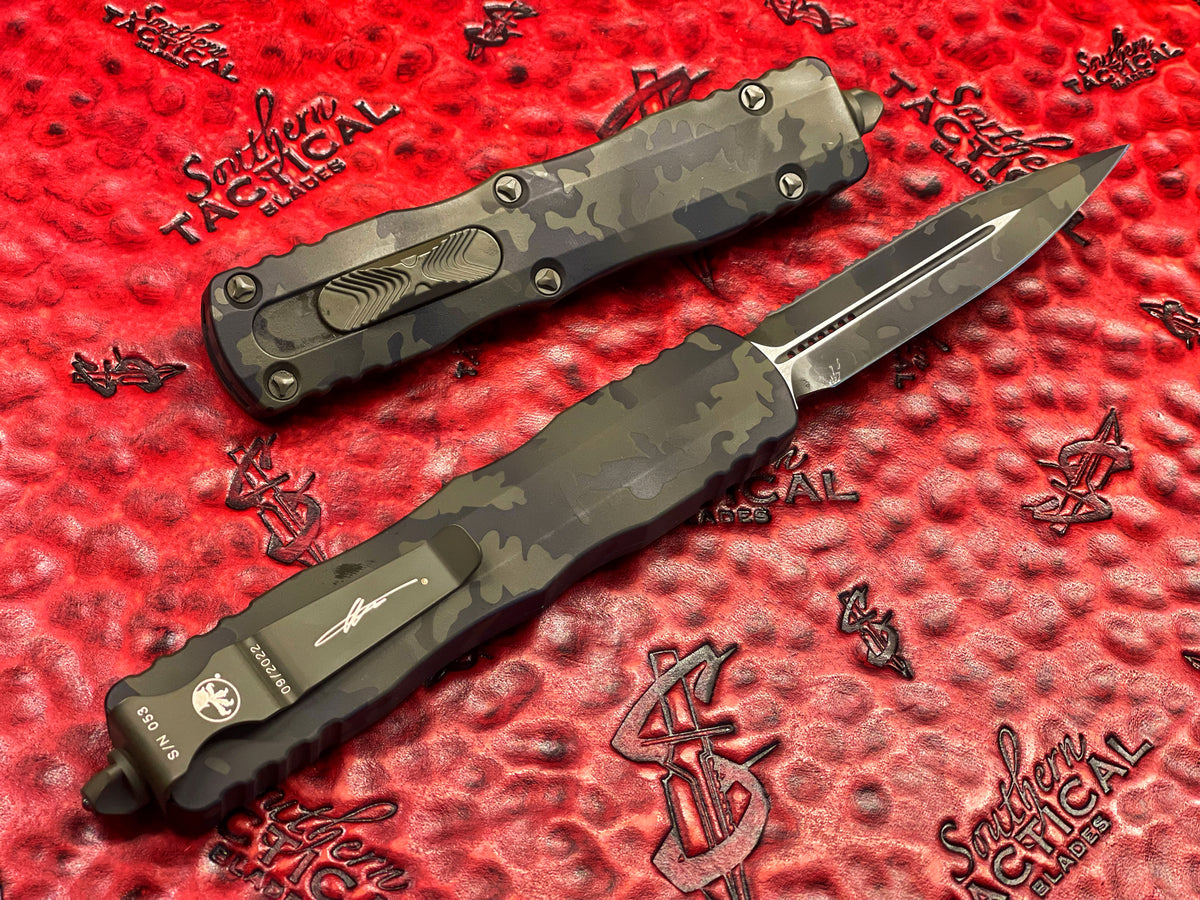 Microtech Dirac Gold Microtech Dirac Delta Double Edge Full Serrated Olive Camo Signature S
